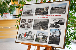 „Rulle im Wandel – Ausschnitte aus der Zeitepoche von 1930 bis heute“ heißt der Titel der Fotocollage, die derzeit im Rathausfoyer zu sehen ist.